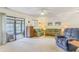 Living room with patio access, seating, and coastal decor at 775 Plantation Dr. # 48, Little River, SC 29566