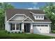 One-story home with a two-car garage and front porch at 812 Big Cedar Dr., Loris, SC 29569