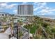 Aerial view of resort pool and beach access at 8500 Margate Circle # 606, Myrtle Beach, SC 29572