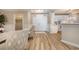 Bright condo entryway with light wood floors and access to kitchen at 8500 Margate Circle # 606, Myrtle Beach, SC 29572