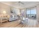 Living room with ocean view, light flooring, and comfy seating at 8500 Margate Circle # 606, Myrtle Beach, SC 29572
