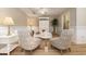 Cozy sitting area with two armchairs and a wood-like floor at 8500 Margate Circle # 606, Myrtle Beach, SC 29572