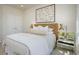 Bright bedroom with a comfortable bed and stylish decor at 8579 Balmy Breeze Pl. # 43, Myrtle Beach, SC 29572