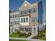 3-story townhouse with brick and siding exterior, landscaping and walkway at 8579 Balmy Breeze Pl. # 43, Myrtle Beach, SC 29572