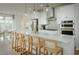 Modern kitchen with white cabinets, quartz counters, and gold accents at 8579 Balmy Breeze Pl. # 43, Myrtle Beach, SC 29572