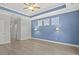 Bedroom featuring natural light, hardwood flooring and trey ceiling at 10 Grace Bay Ct., Pawleys Island, SC 29585
