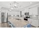 Modern kitchen featuring granite island, stainless steel appliances, and plenty of storage at 10 Grace Bay Ct., Pawleys Island, SC 29585