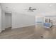 Expansive living area featuring hardwood floors seamlessly connects the living and kitchen spaces at 10 Grace Bay Ct., Pawleys Island, SC 29585