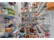 Walk-in pantry featuring organized shelving and ample storage for all your culinary needs at 10 Grace Bay Ct., Pawleys Island, SC 29585