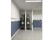 Garage features two modern water heaters, ensuring a reliable and efficient hot water supply for the home at 10 Grace Bay Ct., Pawleys Island, SC 29585