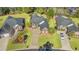 Aerial view of a well-maintained brick home with lush landscaping and driveway at 113 Preservation Dr., Myrtle Beach, SC 29572