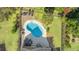 Aerial view of a private backyard pool with lush green landscaping at 113 Preservation Dr., Myrtle Beach, SC 29572