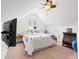 Cozy bedroom with vaulted ceilings, a ceiling fan, and bright, colorful bedding at 113 Preservation Dr., Myrtle Beach, SC 29572