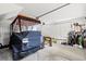 Well-organized garage featuring space for storage with a golf cart parked inside at 113 Preservation Dr., Myrtle Beach, SC 29572