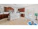 Bright kitchen with white island seating, stainless appliances, and dark cabinets, perfect for modern living at 113 Preservation Dr., Myrtle Beach, SC 29572