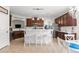 Well-lit kitchen featuring a breakfast bar, stainless steel appliances, and ample cabinet space for storage solutions at 113 Preservation Dr., Myrtle Beach, SC 29572