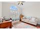 Inviting living room with large arched window, shutters, wood floors, and comfortable seating at 113 Preservation Dr., Myrtle Beach, SC 29572