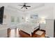 Bright main bedroom with tray ceilings, french doors, and hardwood floors at 113 Preservation Dr., Myrtle Beach, SC 29572