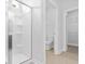 Clean bathroom with a shower, toilet and linen closet at 1135 Nw Rosefield Way, Calabash, NC 28467