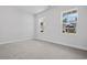 Well-lit bedroom with neutral walls and plush carpeting at 1135 Nw Rosefield Way, Calabash, NC 28467