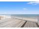 Beachfront deck with ocean views and white railings at 1187 Norris Dr., Pawleys Island, SC 29585