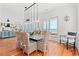 Bright dining room with ocean views and a large table at 1187 Norris Dr., Pawleys Island, SC 29585