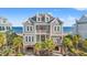 Three-story beach home with ocean views and multiple balconies at 1187 Norris Dr., Pawleys Island, SC 29585