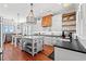 Modern kitchen with white cabinets, island, and ocean views at 1187 Norris Dr., Pawleys Island, SC 29585