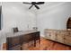 Home office with hardwood floors, built-in shelving, and large desk at 1187 Norris Dr., Pawleys Island, SC 29585