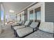 Spacious porch with lounge chairs, perfect for relaxing at 1187 Norris Dr., Pawleys Island, SC 29585