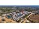 Expansive aerial view of a well-maintained neighborhood featuring modern homes, serene ponds, and lush green landscaping at 141 Foxford Dr., Conway, SC 29526