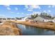 Water view of a fenced backyard with manicured lawn at 141 Foxford Dr., Conway, SC 29526