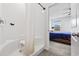 Bright, clean bathroom with a shower area and a view into the bedroom at 141 Foxford Dr., Conway, SC 29526
