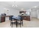 Cozy dining area adjacent to kitchen with a window and stylish chandelier at 141 Foxford Dr., Conway, SC 29526