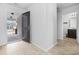 Inviting entryway featuring a black front door, leading to a bright and modern interior at 141 Foxford Dr., Conway, SC 29526