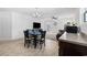 Bright living room featuring a dining area with modern decor and access to other parts of the house at 141 Foxford Dr., Conway, SC 29526