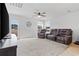 Bright living room with comfortable seating, a ceiling fan, and natural light at 141 Foxford Dr., Conway, SC 29526