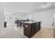 Bright open-concept living space connecting the kitchen and living room at 141 Foxford Dr., Conway, SC 29526