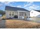 Home's backyard patio, garden, and grill at 146 Caroline Ct., Murrells Inlet, SC 29576
