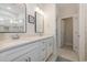 Double vanity bathroom with white cabinets and quartz countertop at 146 Caroline Ct., Murrells Inlet, SC 29576