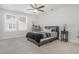 Bedroom with gray bedding and a ceiling fan at 146 Caroline Ct., Murrells Inlet, SC 29576