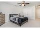 Bedroom with gray bedding and double doors to closet at 146 Caroline Ct., Murrells Inlet, SC 29576