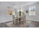 Light-filled dining area with a table and chairs, perfect for Gathering meals at 146 Caroline Ct., Murrells Inlet, SC 29576