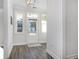 Bright entryway with hardwood floors and neutral colors at 146 Caroline Ct., Murrells Inlet, SC 29576