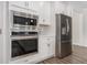 Modern kitchen with stainless steel appliances and white cabinets at 146 Caroline Ct., Murrells Inlet, SC 29576