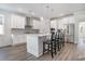Modern kitchen with white cabinets, stainless steel appliances, and an island at 146 Caroline Ct., Murrells Inlet, SC 29576