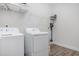 Laundry room with washer, dryer, and overhead shelving at 146 Caroline Ct., Murrells Inlet, SC 29576