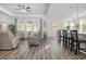 Spacious living room with hardwood floors and recessed lighting at 146 Caroline Ct., Murrells Inlet, SC 29576