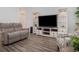 Bright living room with comfy seating and a built-in entertainment center at 146 Caroline Ct., Murrells Inlet, SC 29576