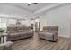 Open living room with hardwood floors and access to kitchen at 146 Caroline Ct., Murrells Inlet, SC 29576